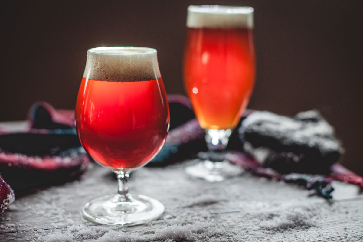 amber colored ales with scarf and snow