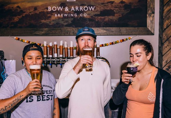 brewery-employees-tasting-beer-bow-and-arrow-brewing-co