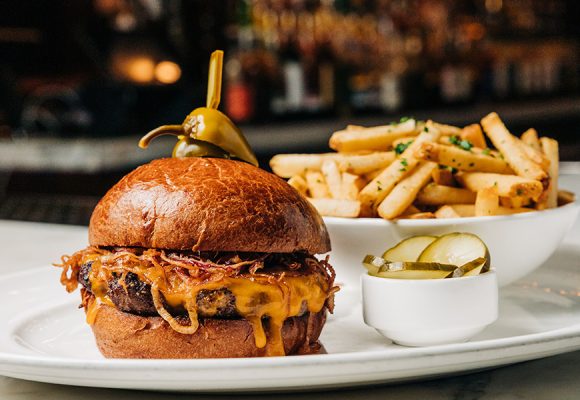 burger and fries on white plate