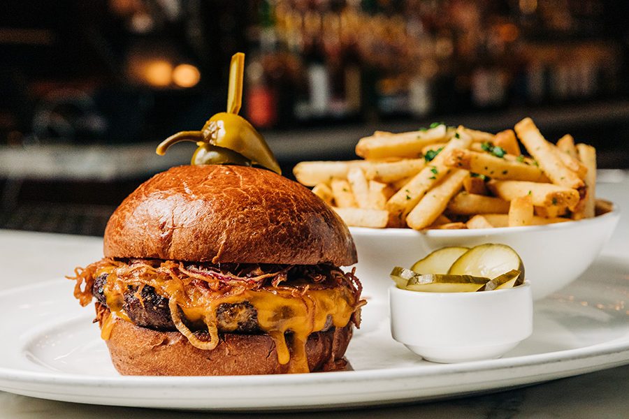 burger and fries on white plate